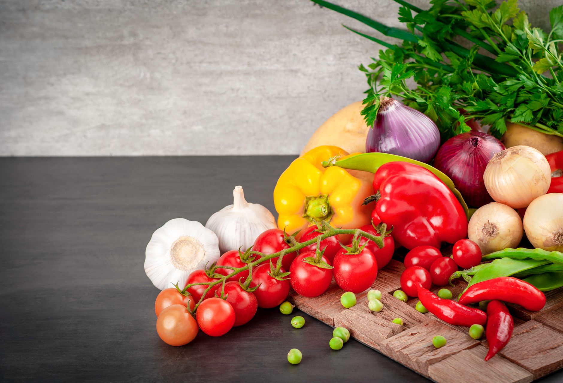 fresh vegetables over a table